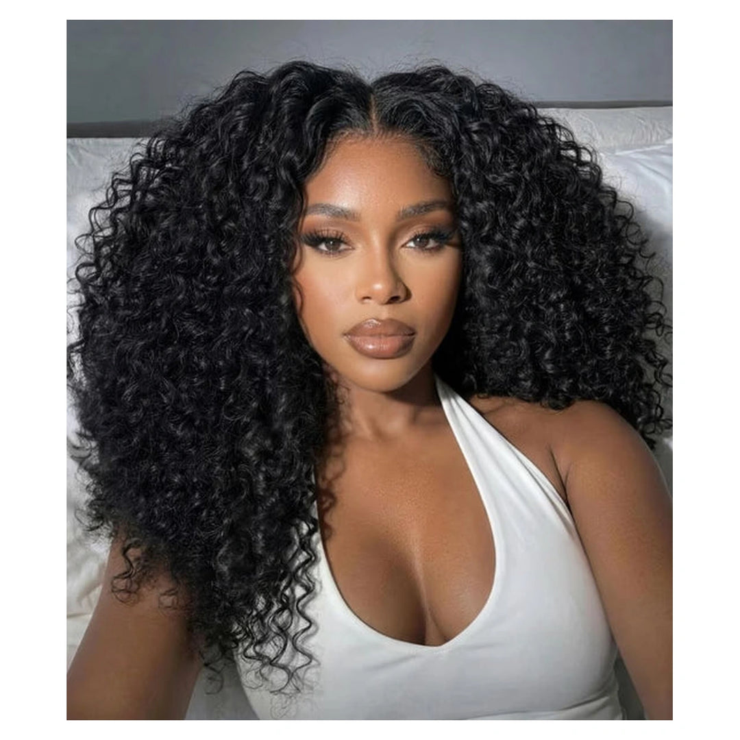 Natural-black fluffy curly human hair wig with a centre part, shown from the front